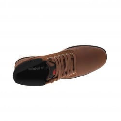Baskets montantes en cuir marron avec des lacets tressés et œillets métalliques