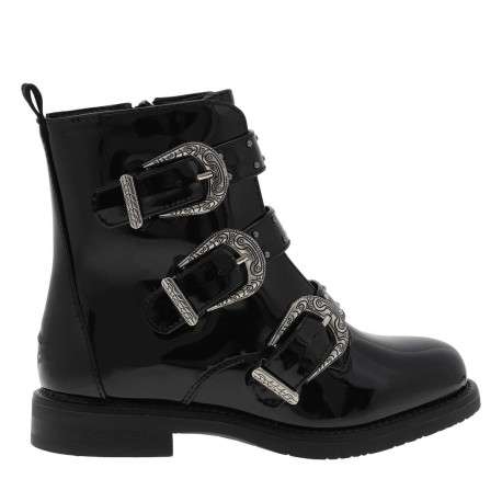 Bottillons fourrés noirs vernis à talon bas, grosses boucles métallisées et zip