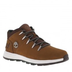 Baskets montantes en cuir nubuck brun semelle intermédiaire blanche et fermeture à lacets ronds bicolores
