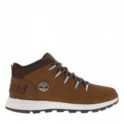 Baskets montantes en cuir nubuck brun semelle intermédiaire blanche et fermeture à lacets ronds bicolores