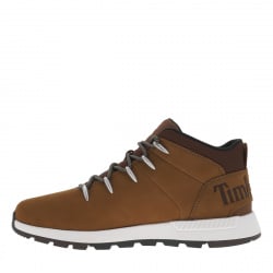 Baskets montantes en cuir nubuck brun semelle intermédiaire blanche et fermeture à lacets ronds bicolores