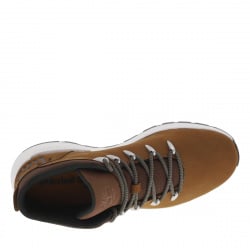 Baskets montantes en cuir nubuck brun semelle intermédiaire blanche et fermeture à lacets ronds bicolores