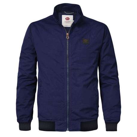 Blouson marine uni coupe droite avec un col montant et un patch à la poitrine
