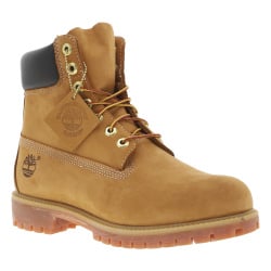 Boots montantes en cuir camel à semelles crantées beige et à lacets ronds bicolore