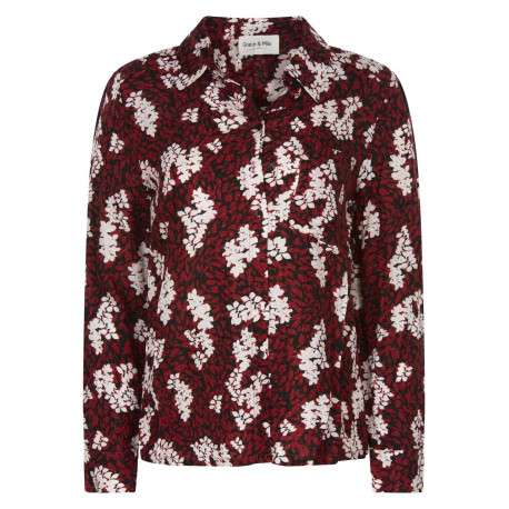 Chemisier rouge à col français et coupe droite avec imprimé feuilles all over