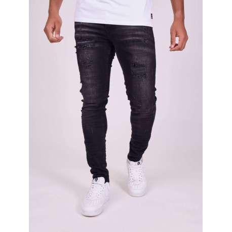 Jean en coton noir uni avec une coupe skinny et un effet troué - Image 2