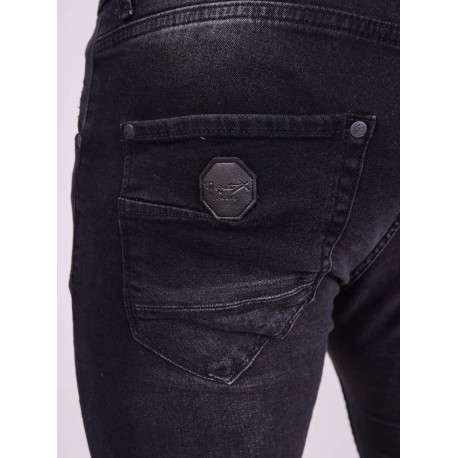 Jean en coton noir uni avec une coupe skinny et un effet troué - Image 4
