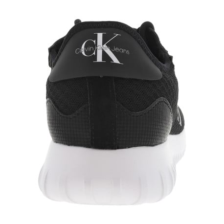 Baskets basses noires avec nom de la marque et monogramme sur l'extérieur - Image 4