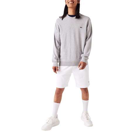 Pull en coton gris uni coupe droite avec un col rond et logo poitrine
