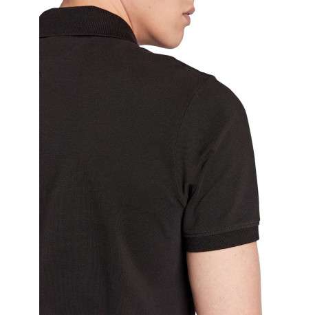 Polo en coton noir avec une fermeture boutonnée et logo iconique - Image 3