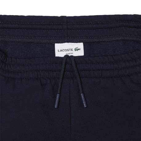 Pantalon de jogging marine en coton coupe slim avec logo brodé et liens de serrage à la taille - Image 12