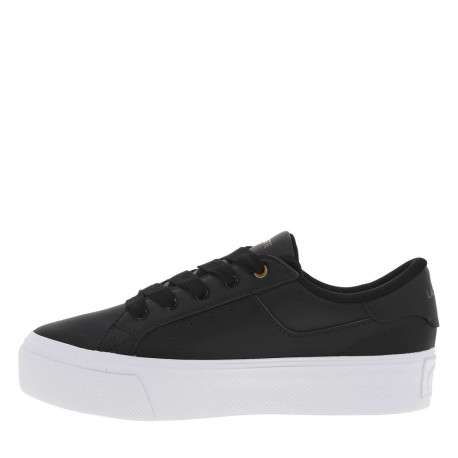 Baskets tennis en cuir noires avec logo embossé sur la semelle plateau blanche