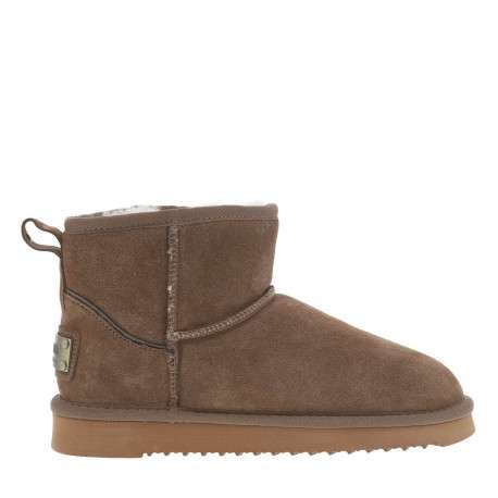 Boots en cuir de vachette beige, fourrées en laine, à semelle plate adhérente - Image 2