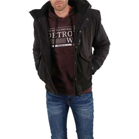 Blouson zippé noir uni avec une coupe droite et un col à capuche