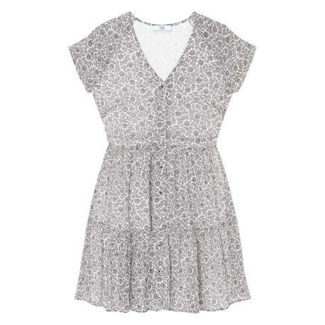 Robe courte blanche fleurie avec une coupe ample un col V et à manches courtes