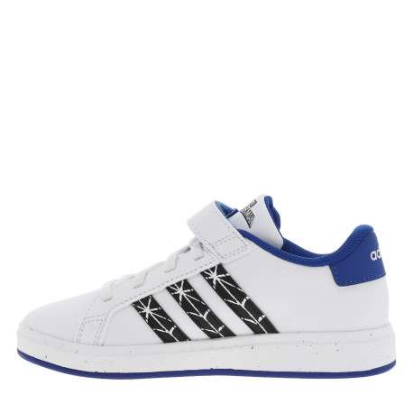 Baskets basses tennis blanches avec lacets plats et une bande auto-agrippante