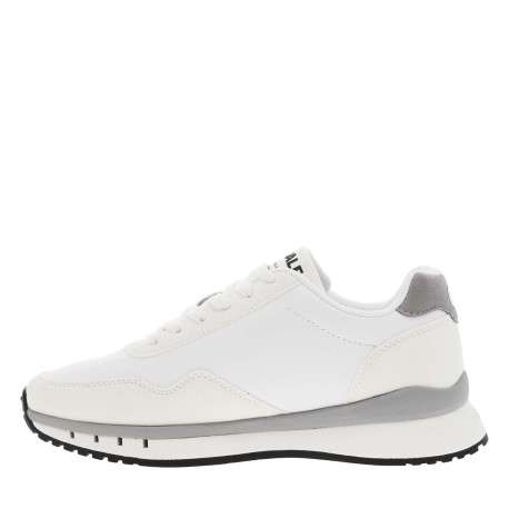 Baskets basses blanches avec une semelle running et des lacets plats
