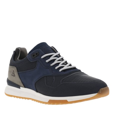 Baskets basses running en cuir bleu marine avec des lacets blancs et noirs