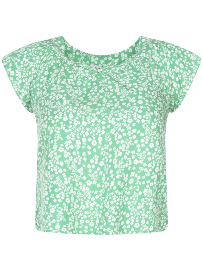 Top vert avec des fleurs et...