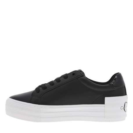 Baskets basses tennis en cuir noires avec logo et une semelle à plateforme