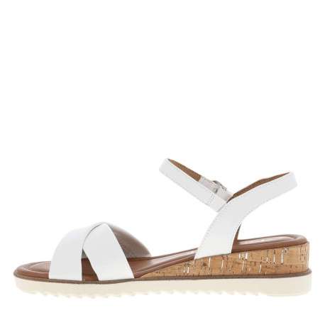 Nu-pieds blancs avec bande auto-agrippante et talon compensé bas en similicuir
