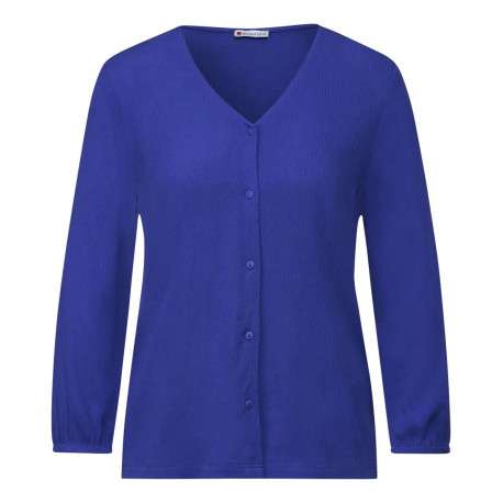 Chemisier bleu uni bi matière avec une coupe droite et un col v