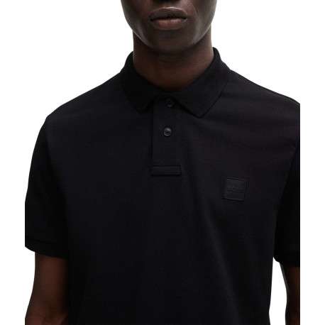 Polo en coton noir uni avec une coupe droite et logo iconique - Image 4