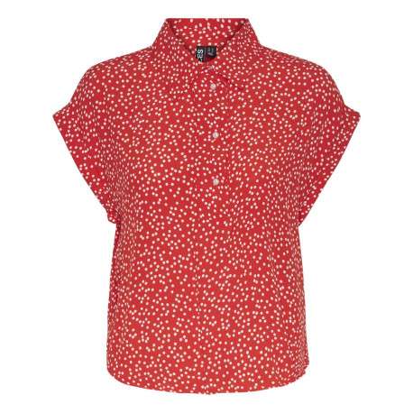 Top rouge uni avec un imprimé à pois blancs une coupe droite et un col v