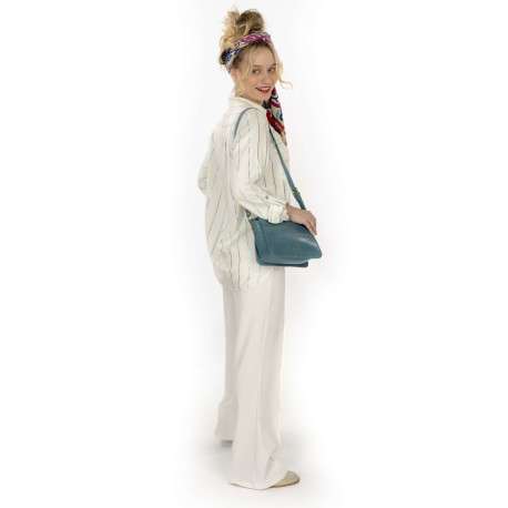 Pantalon écru uni avec une coupe bootcut et 2 poches à l'avant - Image 2