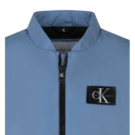 Doudoune sans manches bleue unie à col montant et avec le logo de la marque - Image 3