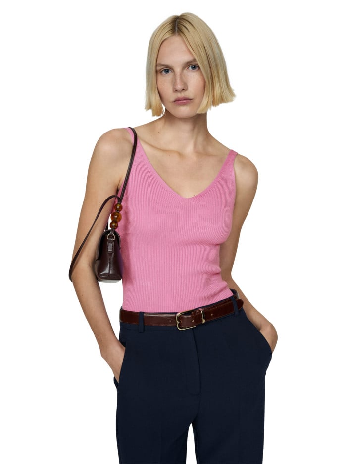 Top rose uni avec des...