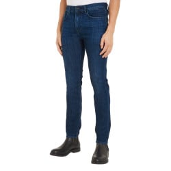 Jean nuit délavé avec une coupe slim à fermeture zippée boutonnée