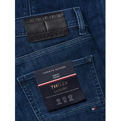 Jean nuit délavé avec une coupe slim à fermeture zippée boutonnée