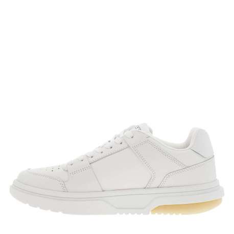 Baskets basses tennis en cuir blanc à semelle à talon plat et à lacets plats