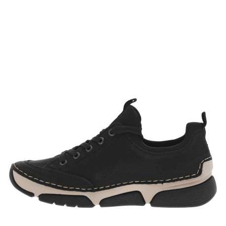 Sneakers noires à talon compensé bas avec semelle beige et zip latéral
