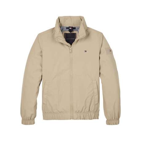 Veste beige uni avec une coupe droite à col montant et fermeture zippée
