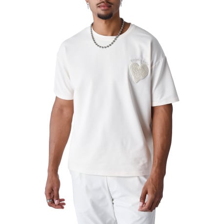 T-shirt écru uni à coupe oversize avec un cœur brodé à la poitrine