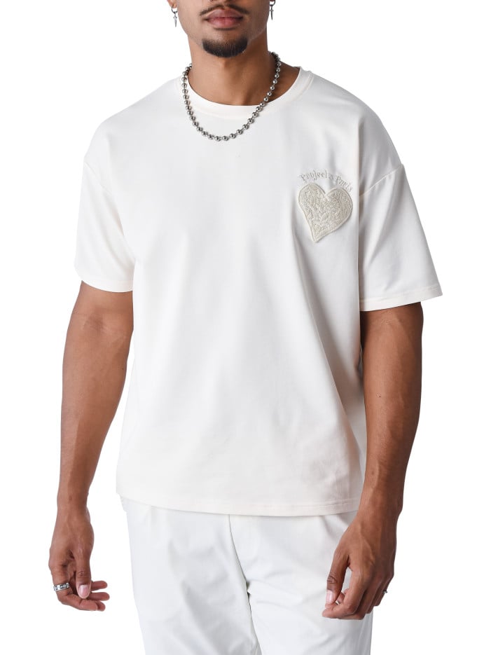 T-shirt écru uni à coupe...