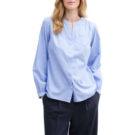 Blouse en coton bleue à pois avec une coupe ample et un col v