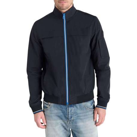 Blouson marine uni fermé par un zip à l'avant avec un col montant