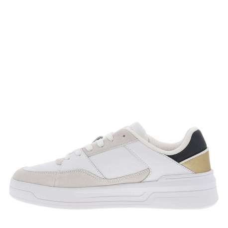 Tennis en cuir blanches à talon plat et à lacets plats avec logo métallique