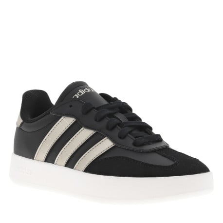 Tennis en croûte de cuir noires à talon plat et lacets plats avec détail argenté
