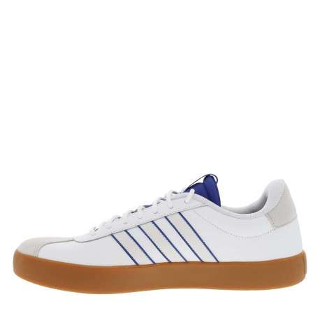 Tennis en cuir blanches et bleues à semelle marron avec lacets ronds tressés