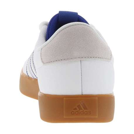 Tennis en cuir blanches et bleues à semelle marron avec lacets ronds tressés - Image 6