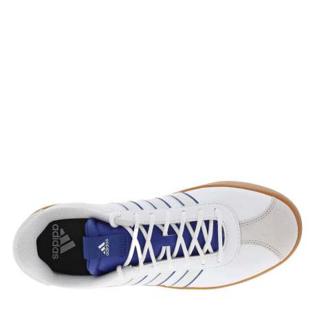 Tennis en cuir blanches et bleues à semelle marron avec lacets ronds tressés - Image 4