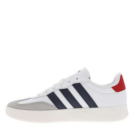 Tennis en cuir blanches à semelle écrue avec logo bleu et rouge