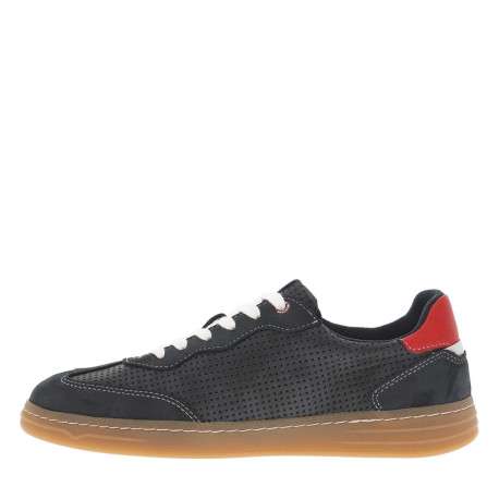 Tennis bleues marine avec des petits trous à semelle plate et à lacets plats