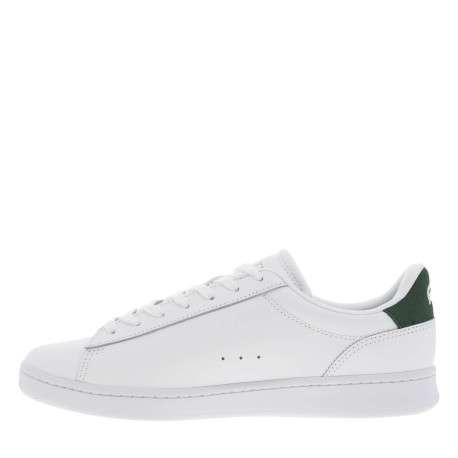 Tennis en cuir blanches avec le logo brodé en petit et à semelle plate