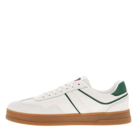 Tennis en cuir écrues avec des détails verts à semelle plate et à lacets plats