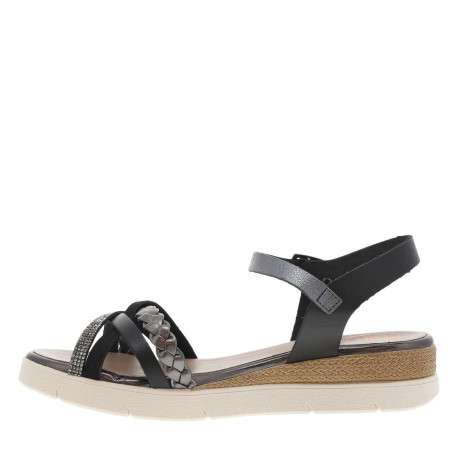 Nu-pieds en cuir noirs à boucle à ardillon avec un talon compensé bas